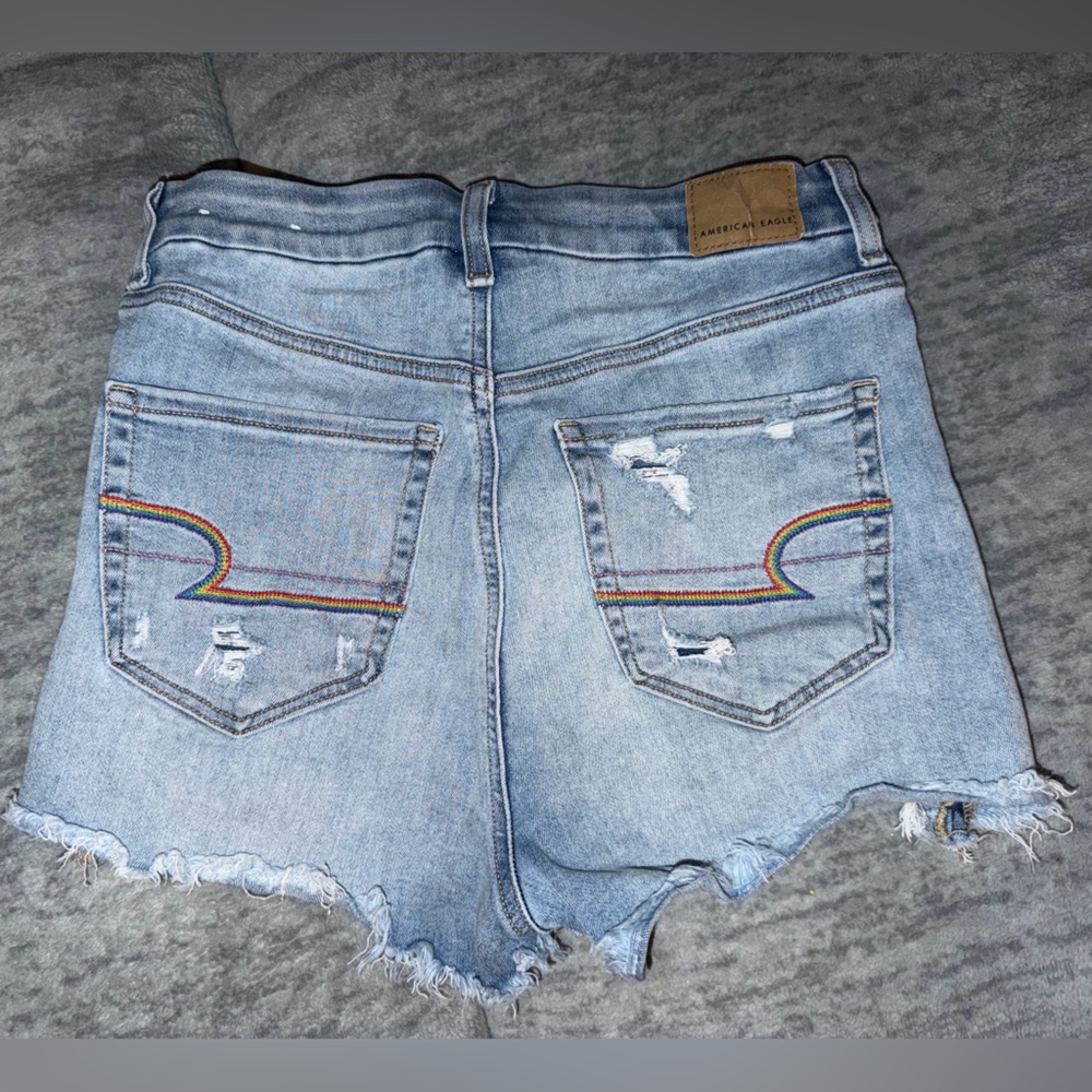 High rise American Eagle jeans with rainbow pockets, size 4